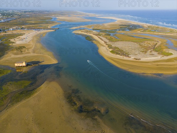 Aerial view of a river surrounded by sandbanks, flowing calmly towards the sea, Fuseta, Fuzeta, Faro, Algarve, Portugal, Europe