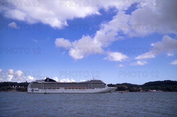 Cruise ship MSC Orchestra sails on the Tagus, Belém, Lisbon, Portugal, Europe