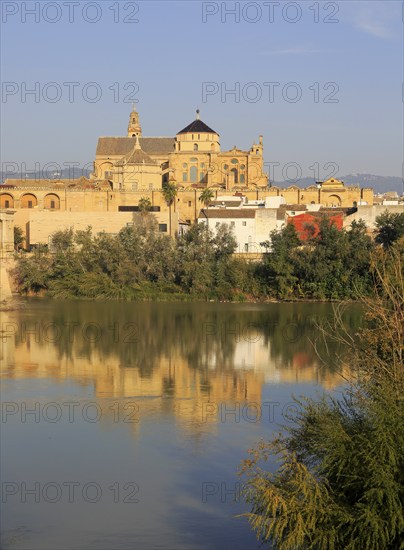 River Rio Guadalquivir and historic Mezquita cathedral buildings, Great Mosque, Cordoba, Spain, Europe