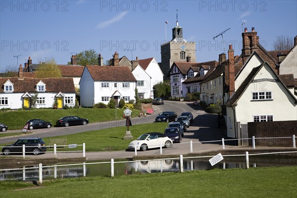 Pond and historic buildings in the attractive tourist honeypot village of Finchingfield, Essex, England, United Kingdom, Europe