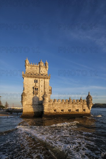 Belem Tower or Tower of St Vincent, famous tourist landmark of Lisboa and tourism attraction, on the bank of the Tagus River Tejo on sunset. Lisbon, Portugal, Europe