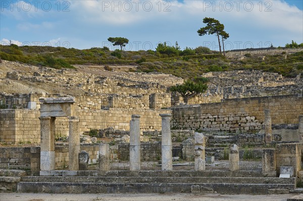 Ancient temple with half-ruined columns and stone structures in a natural setting, Well house, Kamiros, Archaeological site, Ancient city, Foundation of Doric Greeks, Rhodes, Dodecanese, Greek Islands, Greece, Europe