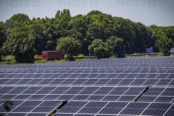 Solar park near Neukirchen-Vluyn, along the A40 motorway, over 10, 000 solar modules spread over 4.2 hectares, generating 6 million kilowatt hours per year, North Rhine-Westphalia, Germany, Europe