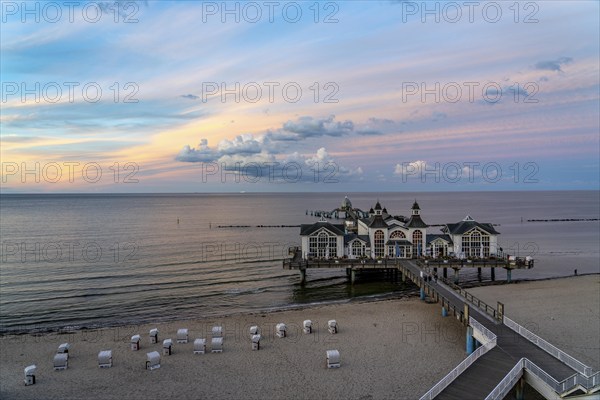 The pier of Sellin, evening mood, sunset, 394 metres long, with restaurant, jetty, beach chairs, island of Rügen, Mecklenburg-Western Pomerania, Germany, Europe