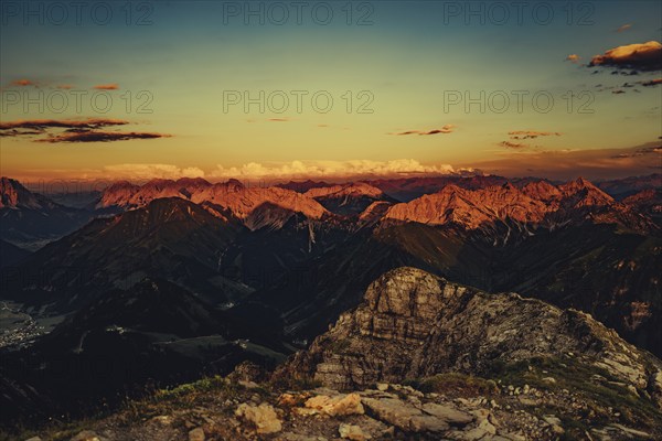 Thaneller summit at sunset in the Lechtal valley in Tyrol with a wonderful view of the surrounding mountains. Tyrol, Austria, Europe