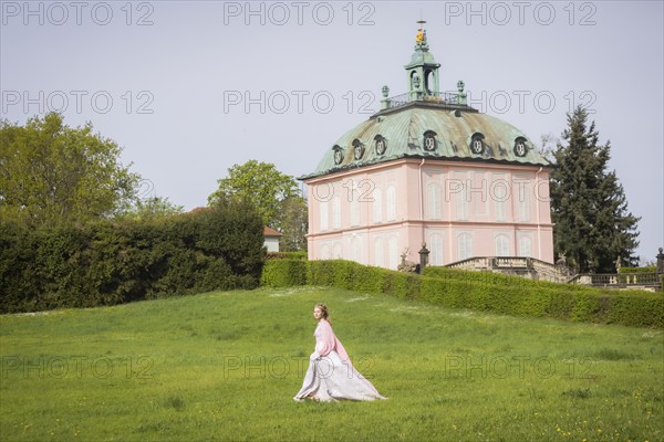 Cinderella can also be seen around Moritzburg Castle in spring. Model Tamara Kretschmer once again slipped into the coveted role of the legendary Cinderella with the ball gown, Moritzburg, Saxony, Germany, Europe