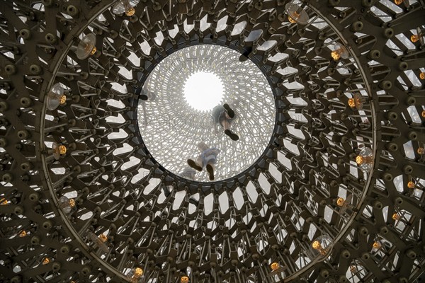 Visitor on glass pane from below, The Hive, artwork by Wolfgang Buttress, Royal Botanic Gardens (Kew Gardens), UNESCO World Heritage Site, Kew, Greater London, England, Great Britain