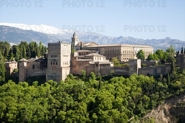 Snow capped peaks of the Sierra Nevada mountains and the Alhambra, Granada, Spain, Europe