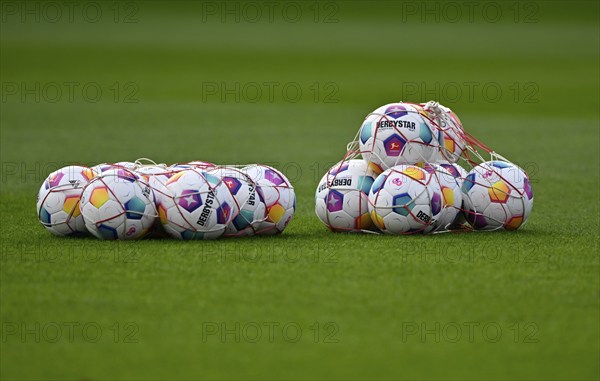 Adidas Derbystar match balls in the ball net lying on the grass, Voith Arena, Heidenheim, Baden-Württemberg, Germany, Europe