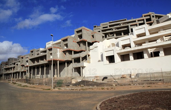 Concrete shells of uncompleted housing in the Castillo development, Caleta de Fuste, Fuerteventura, Canary Islands, Spain, Europe