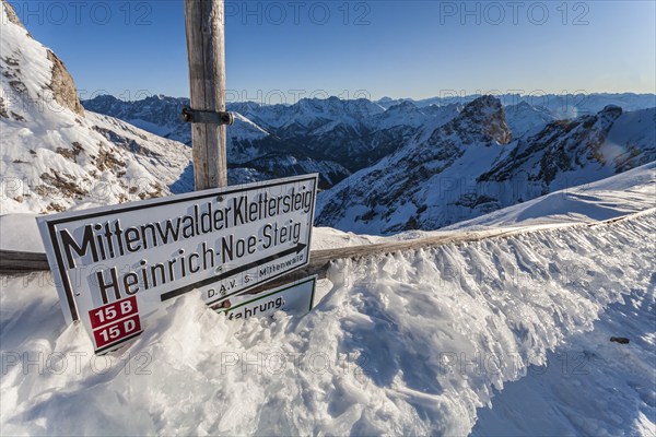 Signpost, sign for via ferrata, winter, snow, ice, Mittenwald via ferrata, Karwendel Mountains, Upper Bavaria, Bavaria, Germany, Europe