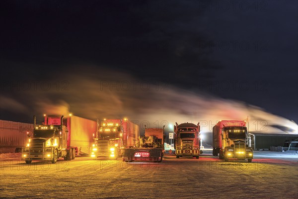 Truck, trucks, running engine, snow, winter, cold, Arctic, night shot, Eagle Plaines, Dempster Highway, Yukon, Canada, North America