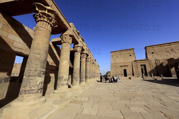 Temple of Isis, Temple of Philae on the island of Agilkia, Temple of Isis, tourists in front of the Sauelengang, part of the temple complex, Africa, Upper Egypt, Egypt, Africa