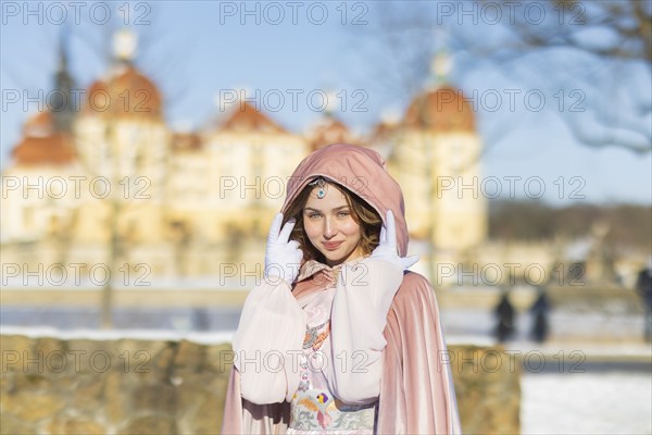 This year, the most popular fairytale film of all time is celebrating a special anniversary. At Moritzburg Castle, one of the film's locations, the exhibition of the cult film Three Hazelnuts for Cinderella opens for the twelfth time - with an anniversary-worthy supporting programme and special exhibition. Model Tamara Kretschmer once again slips into the coveted role of the legendary Cinderella with the ball gown, Moritzburg, Saxony, Germany, Europe