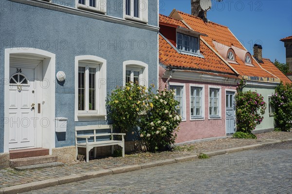 Old houses with roses on a tiny street in the small town of Ystad, Skåne county, Sweden, Scandinavia, Europe