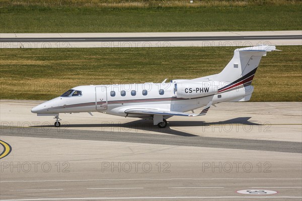 An Embraer 505 Phenom 300 aircraft of Netjets Europe with the registration CS-PHW at Split Airport, Croatia, Europe