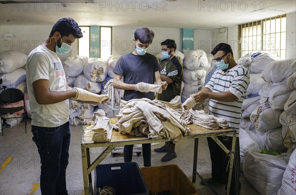 Employees of Inter Market Knit Private Limited producing socks. Lahore, 22.08.2024. Photographed on behalf of the Federal Ministry for Economic Cooperation and Development