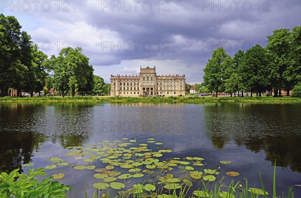 Europe, Germany, Mecklenburg-Western Pomerania, Ludwigslust, Ludwigslust Palace, front with water lily pond, built from 1772 to 1776 for Duke Friedrich von Mecklenburg-Schwerin, late Baroque, Schwerin, Mecklenburg-Western Pomerania, Germany, Europe