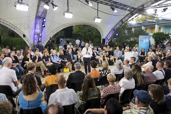 Olaf Scholz (Chancellor of the Federal Republic of Germany, SPD) surrounded by guests at the Chancellor's meeting at ufaFabrik in Berlin on 4 September 2024