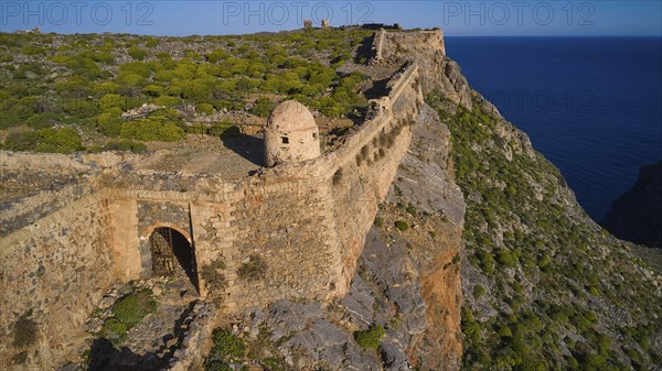 Drone shot, A stony section of a former fortress along a cliff edge overlooking the sea, Venetian sea fortress, Gramvoussa, Gramvoussa peninsula, Pirate Bay, Balos, Lagoon, Northwest Crete, Crete, Greek Islands, Greece, Europe