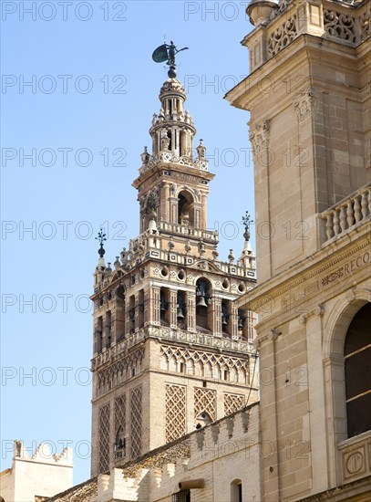 La Giralda tower of the cathedral originally built as a Moorish minaret in the twelfth century, Seville, Spain, Europe