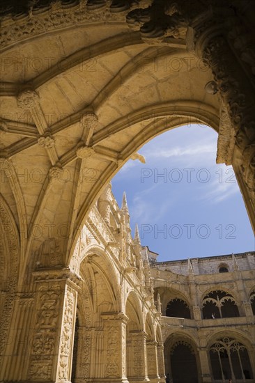 Architectural details on the ceiling of an arch in the inner courtyard at Jeronimos Monastery, Lisbon, Portugal, Europe