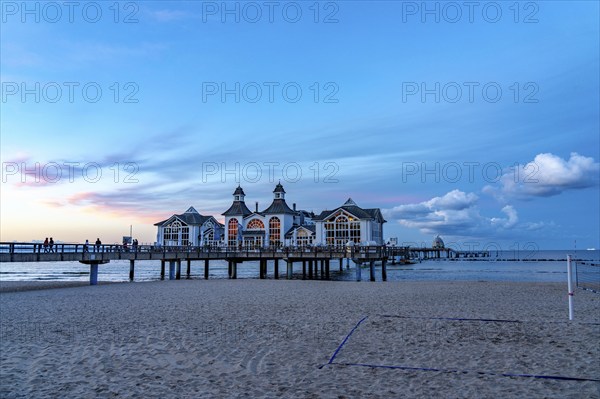 The pier of Sellin, evening mood, sunset, 394 metres long, with restaurant, jetty, beach chairs, island of Rügen, Mecklenburg-Western Pomerania, Germany, Europe