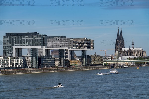 Crane houses, at the customs harbour, Cologne South, residential and office high-rises, cargo ships, Cologne Cathedral, Cologne, North Rhine-Westphalia, Germany, Europe