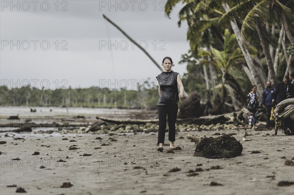 Annalena Bärbock (Bündnis 90/Die Grünen), Federal Foreign Minister, photographed during a briefing on coastal erosion at a cemetery near the settlement of Togoru, flooded by rising sea levels, 07.05.2024. Bärbock is travelling to Australia, New Zealand and Fiji for political talks / Photographed on behalf of the Federal Foreign Office