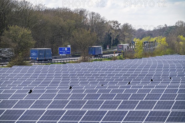 Solar park near Neukirchen-Vluyn, along the A40 motorway, over 10, 000 solar modules spread over 4.2 hectares, generating 6 million kilowatt hours per year, North Rhine-Westphalia, Germany, Europe