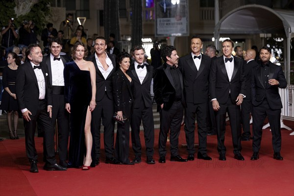 Cannes, France, 17.5.2024: Leonora Darby, Alexander Bertrand, Brunella Cocchiglia, Thomas Martin, Lorcan Finnegan, Julian McMahon, Nicolas Cage and Justin Rosniak at the premiere of The Surfer on the red carpet of the Palais des Festivals during the 77th Cannes International Film Festival. The 77th Cannes International Film Festival will take place from 14 to 25 May 2024, Europe