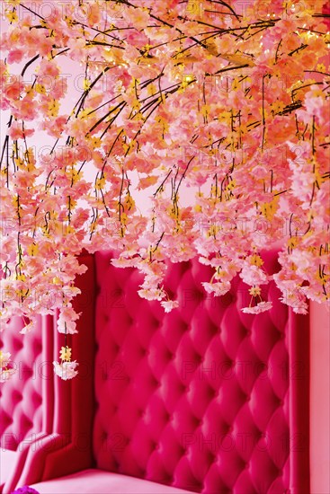 Vintage decoration in pink with plush sofa as furnishing, flowers, interior, design, upholstery, backdrop, interior, colour scheme, architecture, interior design