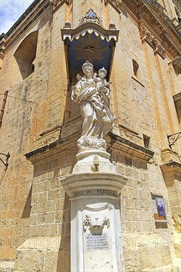 Madonna and baby Jesus Christ statue, Carmelite church and priory in medieval city of Mdina, Malta, Europe