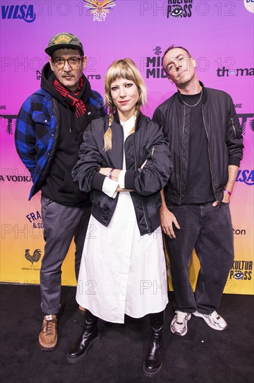 Andy Penn, Mieze Katz and Robert Bob Schütze from the band MIA. on the red carpet in front of the Polyton 2024 award ceremony at the Atelier Gardens in Berlin on 23 October 2024. The award has been held since 2023 and is a successor to the Echo music award