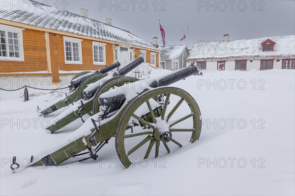 Historical cannons, building, war museum, snow, wind, snowstorm, Vardohus Fortress, Vardo, Varanger Peninsula, Norway, Europe