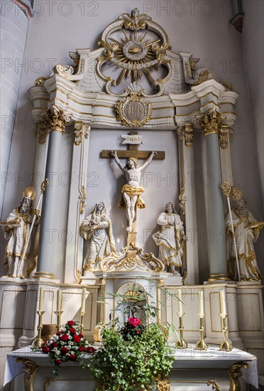 The side altar of the Catholic parish church of St. Johannes Baptist, showing statuesof the saints Liborius and Nikolaus, Borgentreich, Höxter district, North Rhine-Westphalia, Germany, Europe