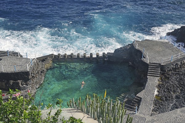 An oceanfront swimming area surrounded by rocks and waves, Charco Azul, San Andres, La Palma, Canary Islands, Spain, Europe