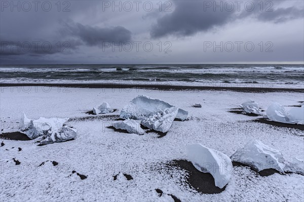 Ice floes on the beach, snowy, waves, sea, clouds, winter, Diamond Beach, Breidamerkursandur, Jökulsarlon, Iceland, Europe