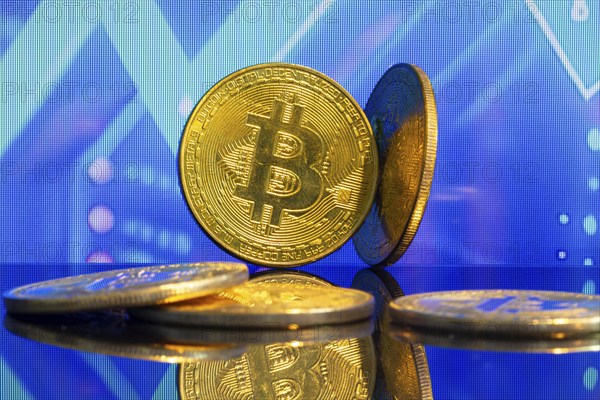 Close-up of symbolic bitcoins