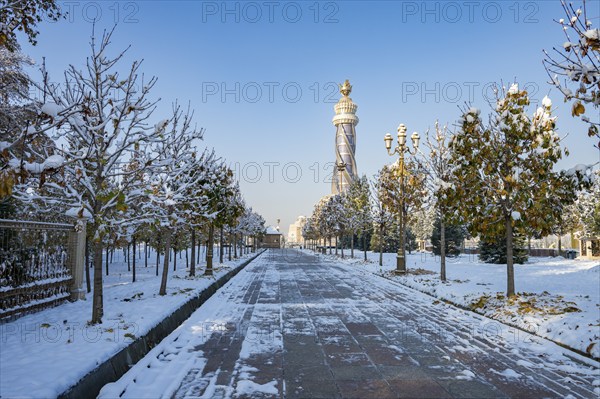 Winter park with Istiklol Tower, Independence and Freedom Tower, Dushanbe, Tajikistan, Central Asia, Asia