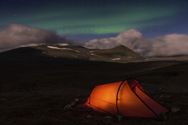 Tent in mountain landscape, Sarek National Park, World Heritage Laponia, Norrbotten, Lapland, Sweden, night shot, lighting, Scandinavia, Europe