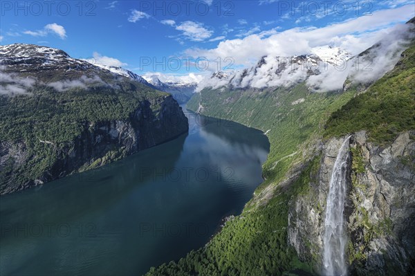 Panorama aerial view of the Geirangerfjord on a sunny spring day, waterfall Gjerdefossen, Norway, Europe