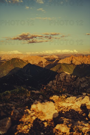 Thaneller summit at sunset in the Lechtal valley in Tyrol with a wonderful view of the surrounding mountains. Tyrol, Austria, Europe