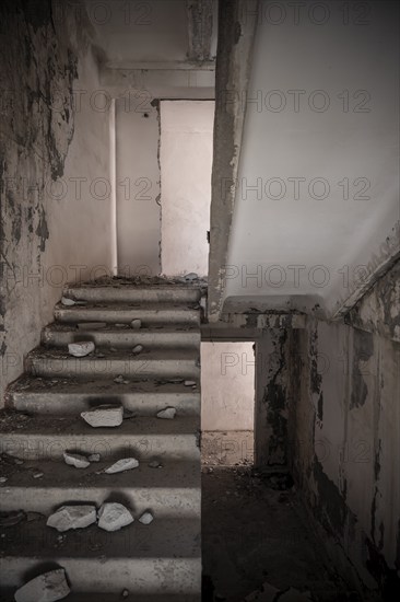 Abandoned destroyed staircase in a residential building, Soviet apartment blocks, ghost town, Engilchek, Tian Shan, Kyrgyzstan, Asia