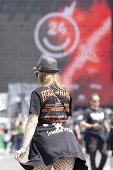 Adenau, Germany, 7 June 2024: Fans during the first day of Rock am Ring. The festival takes place at the Nürburgring race track near the town of Adenau from 7 to 9 June 2024, Europe