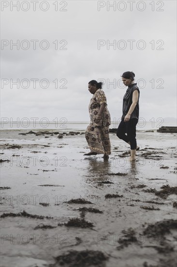 (R-L) Annalena Bärbock (Bündnis 90/Die Grünen), Federal Foreign Minister, and Lavenia McGoon, resident of the Togoru settlement, photographed during a briefing on coastal erosion at a cemetery near the Togoru settlement flooded by rising sea levels, 07.05.2024. Bärbock is travelling to Australia, New Zealand and Fiji for political talks / Photographed on behalf of the Federal Foreign Office