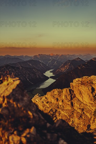 Thaneller summit at sunset in the Lechtal valley in Tyrol with a wonderful view of the surrounding mountains. Tyrol, Austria, Europe