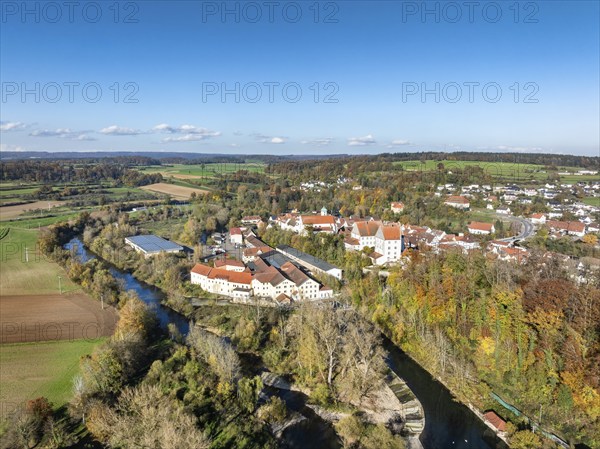 Aerial view of the village of Scheer with the residential palace and the former Kraemer paper mill, today an industrial park on the banks of the Danube, upper Danube valley, Sigmaringen district, Baden-Württemberg, Germany, Europe