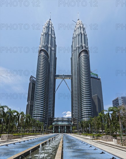 KUALA LUMPUR, MALAYSIA, MAY 5: Petronas Twin Towers in twilight on May 5, 2011 in Kuala Lumpur. They were the tallest building in the world 1998-2004 and remain the tallest twin building