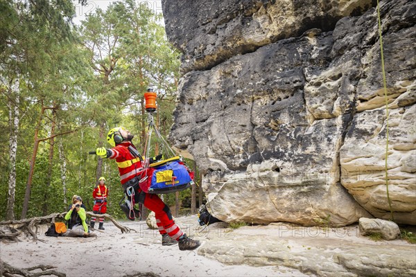 Winch rescue training of the rescue helicopter, Christoph 62, on the occasion of the 50th anniversary of the DRF Luftrettung. The rescue of casualties in the Elbe Sandstone Mountains will be practised